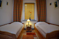 Schlafzimmer mit 2 Einzelbetten FeWo Lübeck